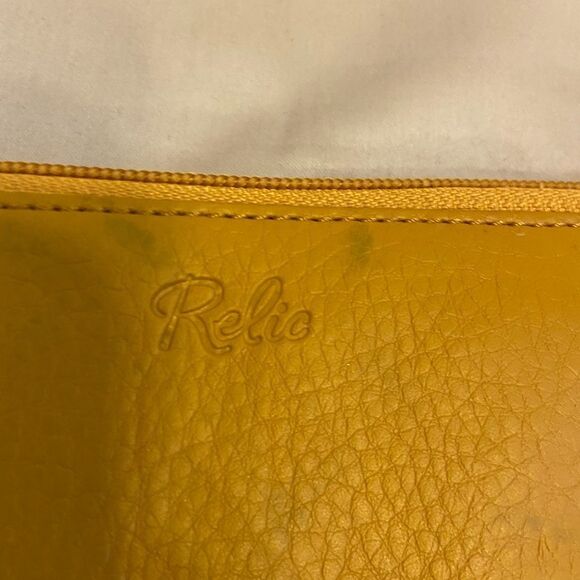 Relic wallet 7”x4” discoloration - Picture 3 of 5